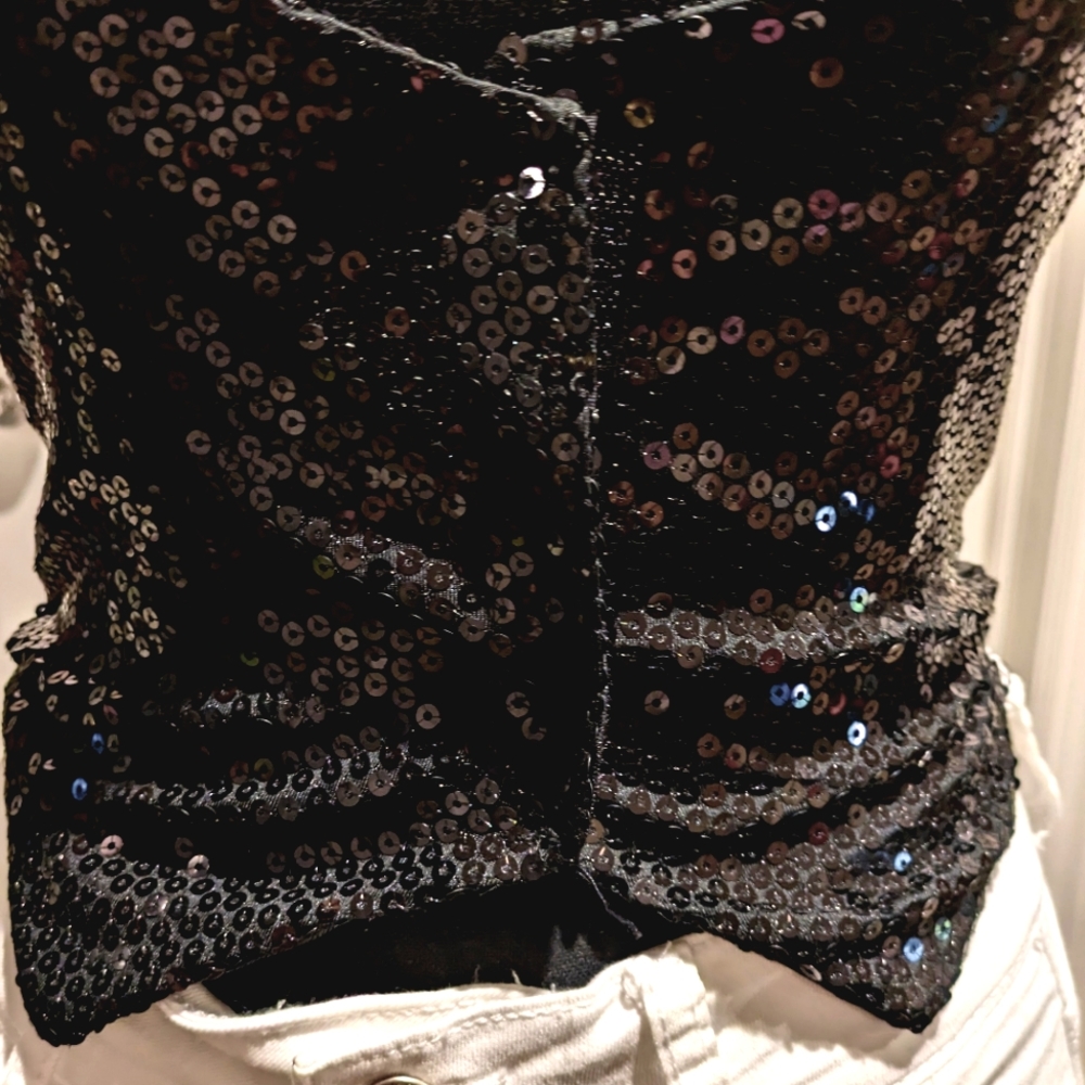 Black sequence vest